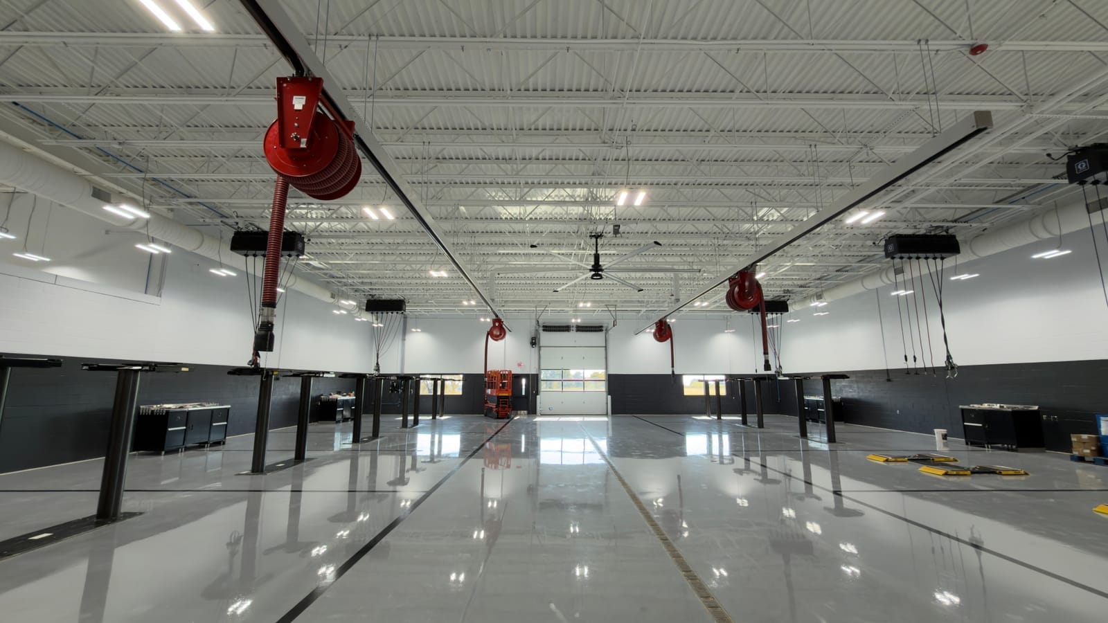 Reflective floors and installed service bays at Nissan Granbury